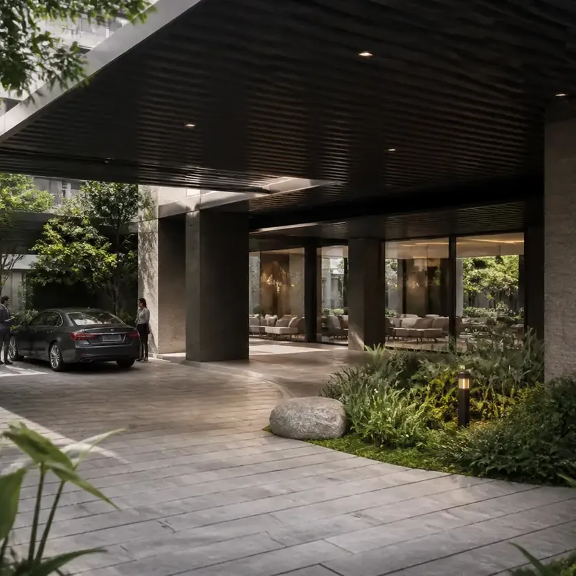 Modern Spaaces Chikkadunnasandra, artistic impression A covered arrival and drop-off with stone floors and planting